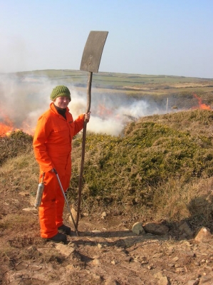 Apprentice Warden Claire Pumfrey with the controlled burning tools of the trade